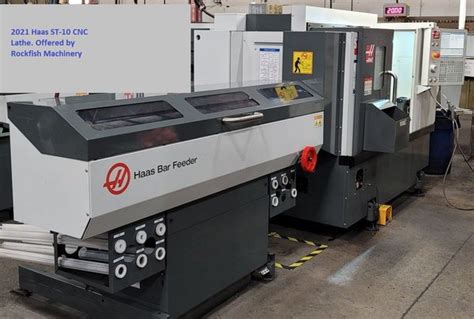 CNC lathe bar feeder .